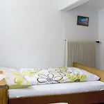 Huber By Interhome Grins